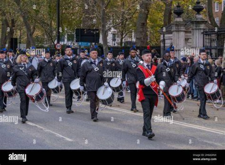 What do the bugles and drums symbolize?